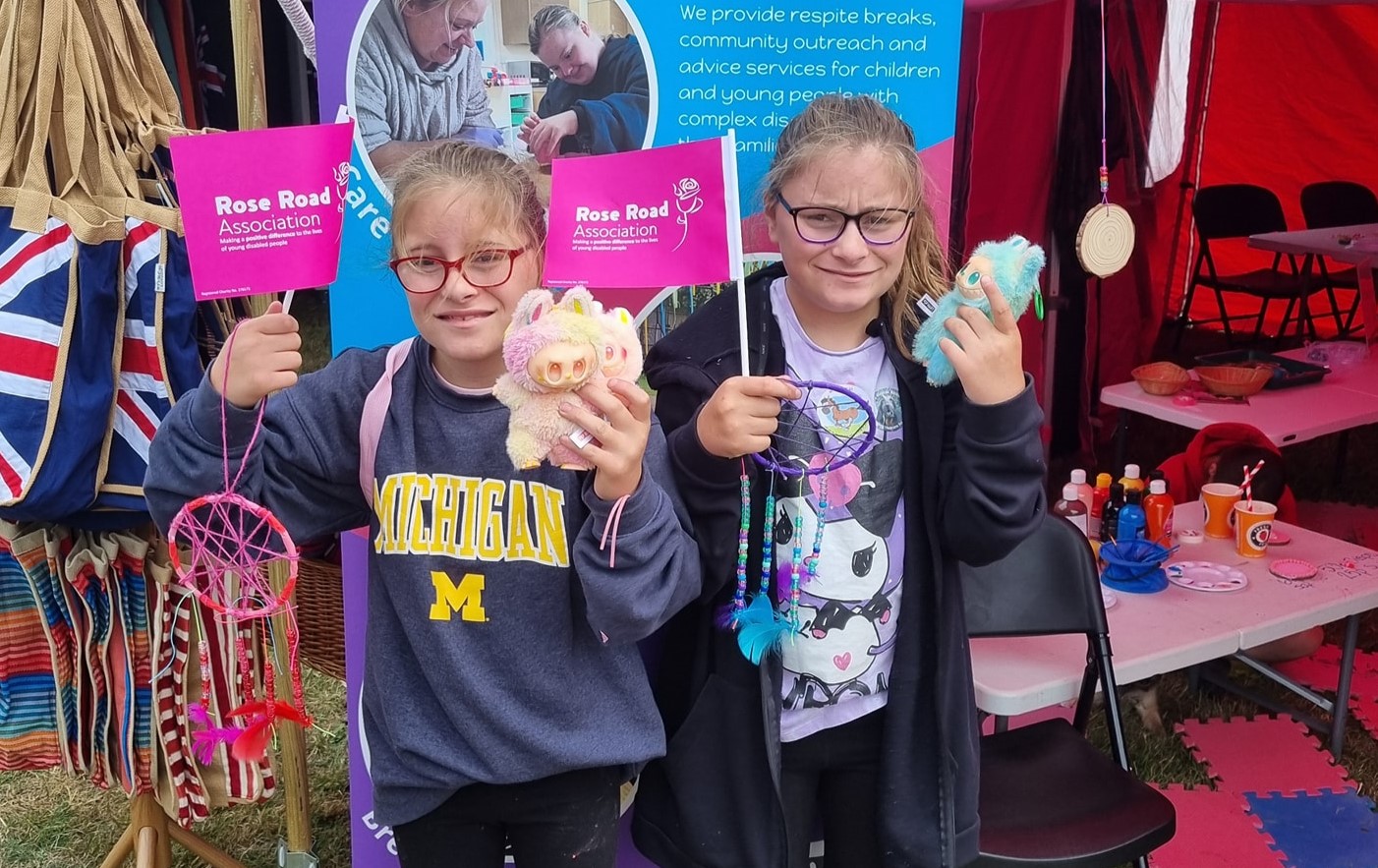 Darcey and Eden at the Rose Road stall at the New Forest show