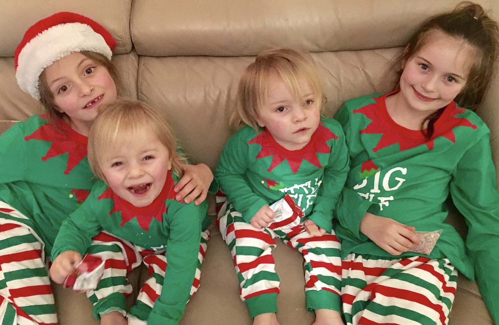 Darcey and Eden with their sisters in elf costumes