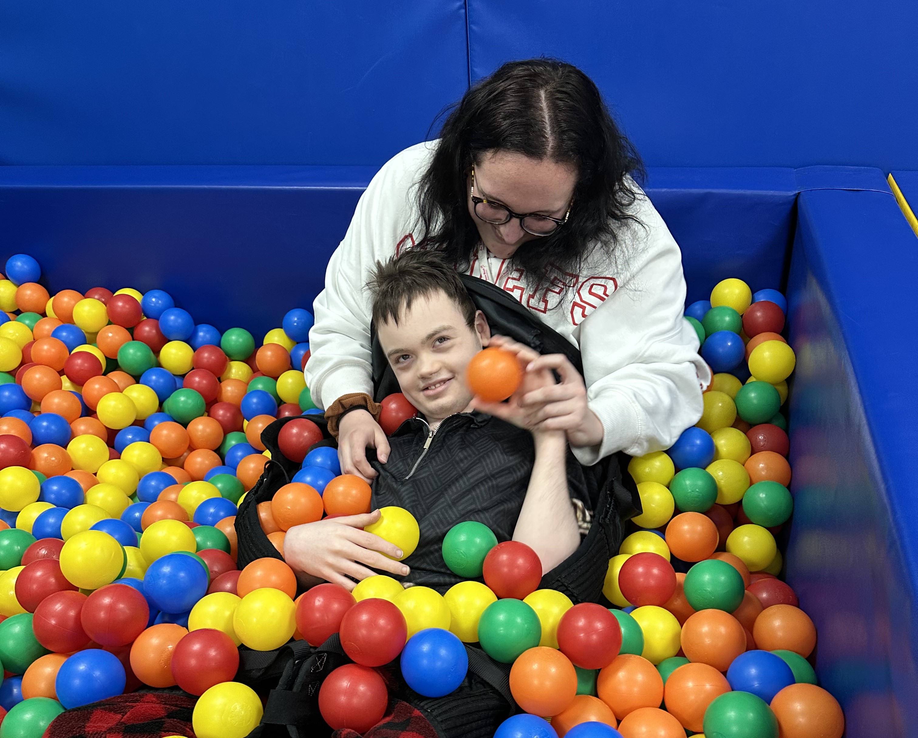 Chester in the ball pit with Lauren